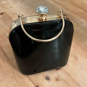 Shinny Black Purse with Gold Accents